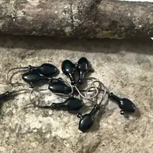 Black powder paint on jig heads — finished jig heads painted with Family Fishin black powder paint