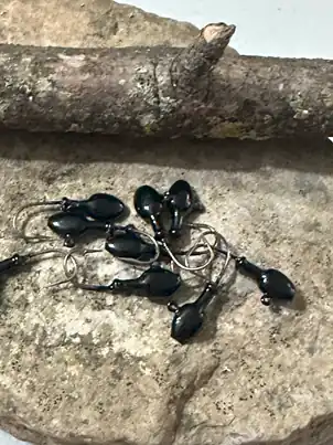 Black powder paint on jig heads — finished jig heads painted with Family Fishin black powder paint